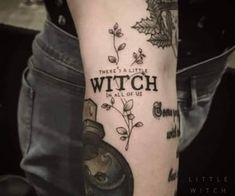 a person with a tattoo on their arm that says, there is a little witch in all of us