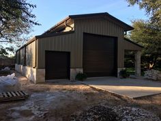 a large garage with two doors on the side