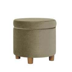 a small stool with wooden legs and a round foot rest in grey velvet upholstered