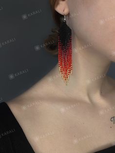 These red fringe earrings are made of high-quality Czech beads and strong synthetic thread. They are elegant, fashionable, and highly versatile, suitable for everyday wear. Red Beaded Tassel Drop Earrings, Red Beaded Earrings With Tassels And Round Beads, Red Beaded Earrings With Tassels, Red Beaded Dangle Earrings With Tassels, Red Beaded Fringe Tassel Earrings With Round Beads, Red Beaded Fringe Tassel Earrings, Red Tassel Earrings With Beaded Fringe, Red Tassel Beaded Earrings, Red Beaded Tassel Earrings