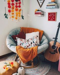 a room filled with lots of different types of furniture and decorations on the wall above