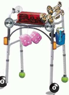 an electronic device is attached to a metal frame with balls and bells on it,