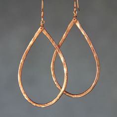 This unique large hoop earrings are handmade using thick copper filled wire. Free shipping for US customers. Perfect gift for any occasions. Teardrop is the best shape of earrings which compliment all face shapes. The teardrop implies the purity and softness of water. It stands for the irresistible natural force. It is gravitating, playful and feminine. I hand-textured each piece of the jewelry. Due to the handmade nature of these earrings, each set may vary very slightly. However, that is the b Copper Wire Wrapped Teardrop Earrings As Gift, Elegant Teardrop Copper Hoop Earrings, Elegant Copper Teardrop Hoop Earrings, Rose Gold Hammered Teardrop Jewelry, Elegant Copper Teardrop Earrings Gift, Handmade Copper Teardrop Hoop Earrings, Copper Hoop Earrings For Gift, Copper Wire Teardrop Earrings, Handmade Copper Teardrop Earrings For Gift