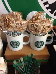 starbucks coffee cups filled with cookies and marshmallows