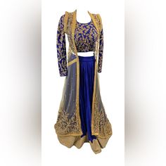 This Elegant Royal Blue Lehenga Is Perfect For Any Event! It Can Be Worn Down To Be More Casual Without The Jacket Or Add The Jacket To Make A More Fancy Look. The Lehenga Is Raw Silk Material And Has Can-Can Under To Add Flare. The Blouse Is Also Raw Silk With The Same Work Through The Back And Front. The Jacket Is Gold Net With Gold Work As Well. I Have Only Worn This Outfit Twice, So It’s Pretty Much Brand New. You Will Definitely Steal The Show With This Outfit! Please Contact For Specific M Elegant Blue Designer Outerwear, Festive Blue Lehenga With Long Sleeves, Elegant Blue Choli With Traditional Drape, Elegant Blue Outerwear With Zari Work, Blue Zari Work Outerwear For Wedding, Blue Wedding Outerwear With Zari Work, Elegant Blue Embroidered Choli, Fitted Royal Blue Traditional Drape Set, Festive Blue Party Outerwear