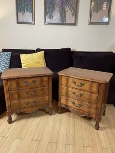 two pieces of furniture sitting on top of a hard wood floor