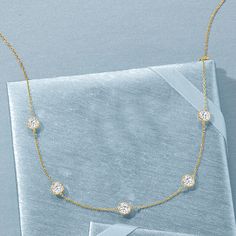 Ross-Simons - 3.50 ct. t. w. Cubic Zirconia Station Necklace in 14kt Yellow Gold. 16". With its twinkling bezel-set rounds, this pretty 3.50 ct. t. w. CZ station necklace will bring an elegant design element to your jewelry collection. Here, seven round brilliant-cut CZs parade a 14kt yellow gold cable chain. Springring clasp, CZ station necklace. CZ weights are diamond equivalents. Classic Station Necklace With Bezel Setting For Anniversary, Classic Round Station Necklace For Formal Occasions, Classic Bezel Set Station Necklace For Anniversary, Classic Brilliant Cut Station Necklace As Gift, Wedding Diamond Necklace With Vs Clarity, Gift Station Necklace With Diamond Accents And Cubic Zirconia, Classic Yellow Gold Station Necklace For Anniversary, Silver Round Station Necklace For Anniversary, Gold Diamond Necklace With Round Stone For Anniversary