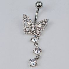 a diamond butterfly belly button ring is shown