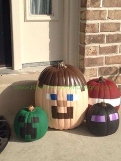 three pumpkins are sitting on the front porch with their faces painted to look like people