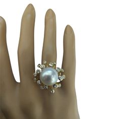 Stamped: 14K Total Ring Weight: 10 Grams Pearl Measures 13.10 MillimetersDiamond Weight: 0.80 carat (F-G Color, VS2-SI1 Clarity )Face Measures: 23.10x24.10 Millimeter SKU: [600628] Luxury High Luster Rings For Formal Occasions, Luxury Pearl Ring With Diamond Accents For Anniversary, Timeless High Luster Rings For Formal Occasions, Fine Jewelry Diamond Ring With High Luster, Luxury Anniversary Pearl Ring With Brilliant Cut, Luxury Brilliant Cut Pearl Anniversary Ring, Luxury Pear-shaped Cluster Ring For Anniversary, High Luster Diamond Wedding Rings, Luxury Diamond Pearl Ring For Anniversary