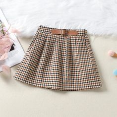 Toddler Kids Girls' Black Sweater Plaid Skirt Two Piece Set - PrettyKid Winter Cotton School Skirt, Winter School Cotton Skirt, Trendy Winter School Skirt, Trendy Winter Skirt For School, Cute Cotton Skirt For Fall, Winter School Pleated Skirt, Brown School Skirt For Fall, Brown Skirt For School In Fall, Skirt Two Piece