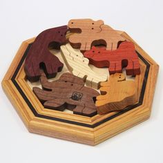 a wooden puzzle with different animals on it