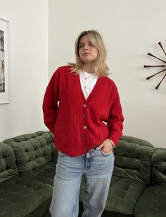 Burberry Vintage Red Wool Cardigan / Made In Scotland  Material: 100% Wool  Vintage condition level: good condition  MODEL is 5.3 ft 164 cm tall usually size S  Size: M  FLAT MEASUREMENTS (unstretched):  Length: Armpit to armpit:  Shoulder to shoulder:  Sleeve:  Every item is vintage, pre-used, pre-loved, one-of-a-kind. All orders are final and sold as-is.  If you have any questions, please contact us before purchase. Irregularities or signs of wear might be present.  Visit our shop:  https://ww Red Cable Knit Long Sleeve Cardigan, Red Long Sleeve Cable Knit Cardigan, Cozy Red Cable Knit Cardigan, Classic Red Cardigan For Layering, Red Cozy Cardigan For Layering, Classic Red Outerwear For Layering, Casual Red Cardigan For Work, Red V-neck Cardigan With Pockets, Vintage Red V-neck Cardigan