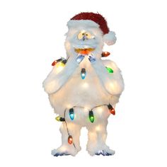 a white stuffed animal with christmas lights on it's chest and arms, standing in front of a white background