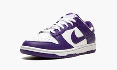 The Nike Dunk Low “Court Purple” is a two-tone, white-and-purple colorway of the retro basketball shoe that was released in 2022.  The “Court Purple” Dunk Low features a white leather base with contrasting Court Purple overlays and Swoosh branding.  White “Nike” branding is embroidered on the heel and Court Purple “Nike” and Swoosh detailing are printed on the white nylon tongue tag on the white nylon tongue.  A two-tone, white midsole and Court Purple rubber outsole completes the look. Dunk Low Court Purple, Nike Kicks, Retro Basketball Shoes, Purple Nikes, Sneaker Stores, Nike Brand, Purple Shoes, Nike Dunk Low, Sneaker Collection