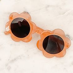 Summer is almost here! Getting your little ones ready for the sunshine with these fun flower sunnies. These sunnies best fit children ages 2-12. Playful Orange Plastic Sunglasses, Fun Orange Sunglasses For Summer, Spring Orange Polarized Sunglasses, Orange Sunglasses For Spring Vacation, Playful Polarized Sunglasses For Spring, Orange Polarized Sunglasses For Spring, Cute Flower Shaped Sunglasses With Uv Protection, Playful Orange Sunglasses For Beach, Cute Adjustable Sunglasses For Spring