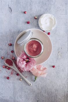 Jar of Cranberry Lip Gloss staged with flowers and crannberry powder and spoon Cranberry Powder, Fall Lipstick, Homemade Moisturizer, Homemade Makeup, Beet Root, Hello Glow, Mountain Rose Herbs, Unrefined Coconut Oil, Lip Balm Recipes