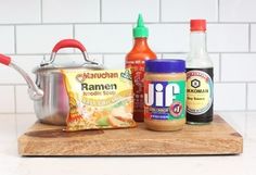 the ingredients to make peanut butter are displayed on a cutting board with text that reads add peanut butter to a bowl of ramen