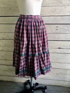 "50s red green plaid peasant skirt 2 tiers with green rick rack trim Full circle skirt Handmade Waist 26\" Length 25\" Width at hem 166\" (measured flat and doubled) Condition - very good vintage" Plaid Tiered Skirt With Ruffles, Plaid Tiered Ruffled Skirt, Plaid Ruffled Cotton Skirt, Plaid Cotton Skirt With Ruffles, Cotton Gingham Skirt With Ruffles, Vintage Green Tiered Skirt, Vintage Plaid Cotton Skirt, Hair Grower, Peignoir Sets