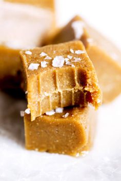 two pieces of peanut butter fudge with sea salt on top