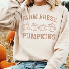 This super-soft fleece-lined Farm Fresh Pumpkins Sweatshirt features a simple pumpkin design and is perfect for Cozy Season! Printed on Gildan unisex sweatshirts for the ultimate in cozy comfort. Please check the size charts for the perfect fit! Details: ✔ 50% ethically grown cotton, 50% polyester ✔ Medium-heavy weight fabric for the perfect amount of warmth ✔ Premium DTG prints - no peeling or cracking ✔ Classic fit in your regular size ✔ Easy care: Machine washable, maintains shape and color ? Fall Fleece Sweater With Letter Print, Fall Fleece Sweater, Easy Pumpkin Designs, Farm Fresh Pumpkins, Patch Sweater, Thanksgiving Sweater, Fresh Pumpkin, Pumpkin Sweatshirt, Pumpkin Sweatshirts