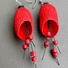 Red statement earrings for party . Very impressive big designer jewelry. The handmade bead is with small wooden beads. There is eco friendly silk cocoons jewelry. You can match necklace to the set. See attached pictures. Modern, bright contrast earrings in Red color. Emphasis your appearance. An exclusive gift for any occasion. May be in any color. The length 2" (5 cm) BE SPECIAL - BE YOURSELF! Special remarks: 1. Thease earrings should be removed before going in the shower or under water.  2. I am doing my best to present the colors of my items as accurately as possible, but all monitors are different and the item may appear slightly different on your screen. Color Emphasis, Red Beaded Earrings, Match Necklace, Red Statement Earrings, Red Bead Earrings, Earrings Red, Red Earrings, Wedding Jewelry Earrings, Exclusive Gift