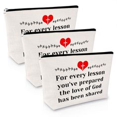 three zippered pouchs with the words for every lesson and hearts in red on them