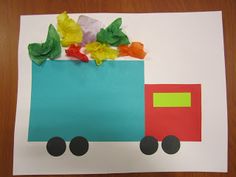 a paper bag with gummy bears in the shape of a truck on top of it