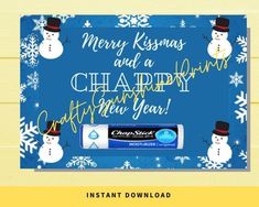 a christmas card with an image of a snowman and a tube of toothpaste