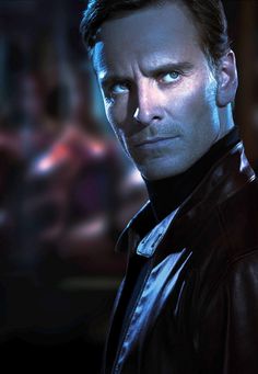 a close up of a person wearing a leather jacket and looking at the camera with an evil look on his face