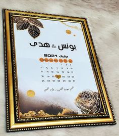 a calendar with arabic writing on it and a bird in the middle is laying down