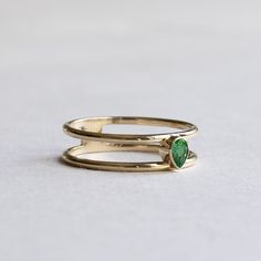 Petite emerald teardrop on this open ring with personalized initial Metal: 14k yellow gold Stone: natural emerald Stone Size: 4mmx3mm Stone cut: Pear Stone Carat Weight: 0.17carat Dimension: Approx 1.3mm x 1.3mm shanks Emerald Stone, Open Ring, Stone Cuts, Natural Emerald, Emerald Ring, Emerald, Gemstone Rings, Initials, Rose Gold