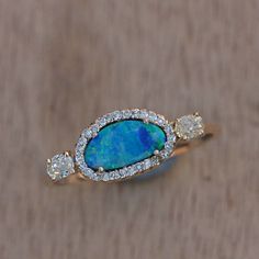 "\"Details: Item code :- ATR-2103 - 14K yellow solid gold (as shown) wt :1.55 gm - 0.28 ct diamonds - 0.48 ct opal - ring size 16 x 7 mm & Ring size 7 us Anjis touch jewelry supports ethical and eco-friendly practices and uses reclaimed and recycled metals whenever possible About my jewelry: All of the Anjis touch jewelry collection is handmade exclusively by me.  I hope that you will enjoy wearing my designs as much as I enjoy making them! Shipping: We have this in stock which we can ship in 1- Yellow Gold Diamond Halo Ring With Gemstone, Dazzling Diamond Opal Ring For Anniversary, Dazzling Diamond Opal Anniversary Ring, Fine Jewelry Opal Ring With Diamond Halo Setting, Opal Ring With Diamond Accents In Prong Setting, Opal Ring With Diamond Accents In 14k Gold, Fine Jewelry Diamond Opal Ring With Halo Setting, Fine Jewelry Diamond Halo Opal Ring, Yellow Gold Opal Ring With Diamond For Anniversary