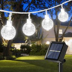 solar powered outdoor lights in front of a house