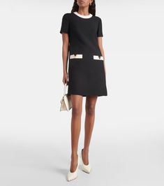 Wool and silk minidress in black - Valentino | Mytheresa Lined Mini Dress For Workwear, Designer Knee-length Mini Dress For Work, Luxury Mini Dress For Workwear, Luxury Mini Dress For Work, Fitted Mini Dress With Side Pockets, A-line Mini Dress With Pockets For Work, Office Mini Dress With Pockets, A-line Mini Dress With Pockets For Formal Occasions, A-line Mini Dress With Pockets For Formal Events