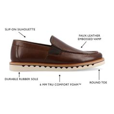 The Dallas loafer from Vance Co. blends sophistication and comfort with its 1-inch heel, slip-on design, and classic round toe. Crafted from faux leather this style offers a stylish alternative. The mesh lining, 6 mm Tru Comfort Foam footbed, and rubber outer sole ensure breathability and cushioned support, making the Dallas loafer a trendy and comfortable choice for various occasions. | Vance Co Men's Dallas Casual, Brown, 8M Semi-formal Slip-ons With Rubber Sole, Wingtip Slip-ons With Removable Insole, Synthetic Slip-on Loafers With Leather Sole, Synthetic Moc Toe Slip-ons With Rubber Sole, Wingtip Slip-ons With Leather Footbed, Modern Wingtip Loafers With Textured Sole, Cushioned Wingtip Slip-on Loafers, Business Casual Synthetic Plain Toe Loafers, Brown Synthetic Loafers With Textured Sole