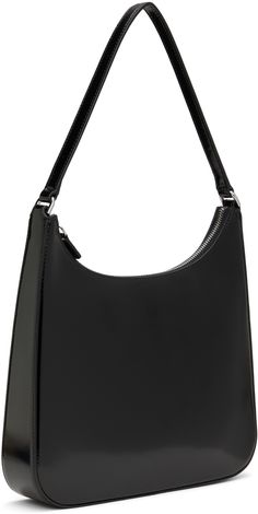 Structured polished leather shoulder bag in black. · Fixed shoulder strap · Logo embossed at back face · Zip closure · Patch and zip pocket at interior · Suede lining · Logo-engraved silver-tone hardware · H11.5 x W11 x D2.5 Supplier color: Black Black Staud Leather Shoulder Bag, Elegant Black Staud Bags, Classic Leather Shoulder Bag By Staud, Classic Staud Leather Shoulder Bag, Staud Black Shoulder Bag, Staud Black Bag For Everyday Use, Staud Black Formal Bags, Modern Black Staud Bags, Staud Black Bag With Detachable Strap