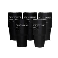 the groomsman travel mugs are lined up in different sizes and colors, including black