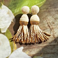 Well-known Oscar Earrings (replica) .Yarkie, stylish, eye-catching, do not go out of fashion, can be your 2.7 inches(7cm) 3.15 inch (8cm) 3.5 inch (9cm) 4 inch (10cm) 4.3inch (11cm) 4.7inch (12cm) 5 inch (13cm) All items in my store are 100% handmade. Please note that - due lighting effects, monitor's brightness, contrast and other settings, there may be some slight differences in the color tone / shade photo web - site and the actual item. Please note that some works are made to order and it ta Gold Tassel Earrings With Round Beads, Elegant Gold Tassel Earrings With Round Beads, White Dangle Beaded Earrings With Tassels, Elegant White Tassel Earrings, Elegant Latkans Earrings, Elegant Latkan Earrings With Round Beads, White Tassel Beaded Drop Earrings, White Dangle Tassel Earrings As Gift, Elegant Tassel Earrings With Round Dangling Beads