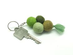 a keychain that has some balls on it