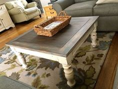 a coffee table with a basket on top in a living room