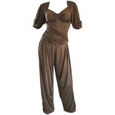 Utterly chic early 1990s / 90s EMANUEL UNGARO taupe silk jersey two piece harem pant set! Features a wonderful slinky draped short sleeve blouse, with a hidden zipper up the side. High waisted draped harem pants feature a button closure at waist, and zipper fly. Pockets at each side of the hips. Fantastic neutral color that is perfect all year, and matches everything. Great together, or as separates. In great condition. Made in Italy Approximately Size Small - Small Medium Measurements: (lots of Black Silk Jumpsuit, Suits Outfits, Vintage Jumpsuit, Harem Pant, Silk Jumpsuit, Black Kimono, Pant Suits, Tank Top Outfits, Vintage Trousers