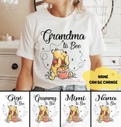 a woman wearing a t - shirt that says grandma to bee and has winnie the pooh on it