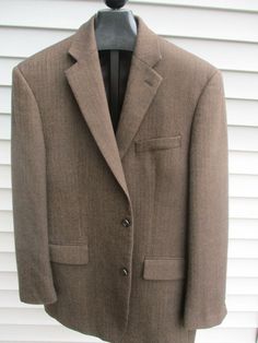 RALPH LAUREN 100% Wool BROWN Herringbone SPORT COAT JACKET BLAZER 42R RALPH LAUREN BROWN HERRINGBONE SPORT COAT The size is 42R. Notched lapel. 2 button closure. 4 smaller buttons accent cuffs. 3 outside pockets sewn shut. 3 interior pockets. Back vent. 100% Wool. Fully lined. ~MEASUREMENTS LAYING FLAT: *Shoulders: 19 Inches Across *Chest: 44 Inches *Length: 31.5 Inches *Sleeves: 24 Inches This CLASSIC SPORT COAT is in GREAT CONDITION! No Holes, Stains or Tears.   DO NOT DUPLICATE OR COPY! Templ Lauren Brown, Jacket Blazer, Sport Coat, Herringbone, Men's Blazer, Blazer Jacket, Suit Jacket, Coats Jackets, Ralph Lauren