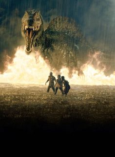 godzilla and other people running in front of a large fire breathing dinosaur with it's mouth open