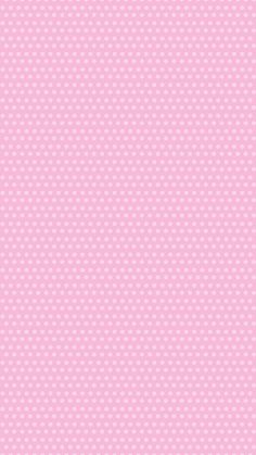 a pink background with white polka dots