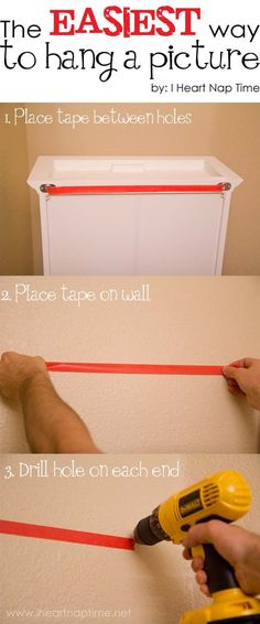 the instructions for how to hang a picture frame with red tape and glue on it