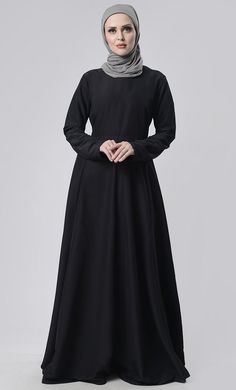 Basic Front Box Pleat Abaya With Pockets - EastEssence.com Long Sleeve Modest Abaya With Modesty Panel, Modest Long Sleeve Abaya With Modesty Panel, Modest Long Sleeve Thobe With Modesty Panel, Solid Color Abaya With Modesty Panel For Eid, Eid Abaya With Modesty Panel In Solid Color, Modest Fitted Black Abaya, Modest Abaya With Modesty Panel, Solid Color Long Sleeve Abaya For Work, Long Sleeve Abaya For Work