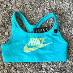 Brand New With Tags Blue Racerback Sports Bra For Light Sports, Blue Nike Sports Bra For Training, Nike Blue Sports Bra For Training, Nike Blue Sports Bra With Moisture-wicking, Nike Sporty Blue Sports Bra, Nike Blue Sports Bra For Workout, Nike Blue Moisture-wicking Sports Bra, Blue Moisture-wicking Tops For Playwear, Blue Sweat-resistant Sports Bra For Gym