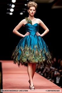 Replace the blue with white and the peacock feathers with fake peacock feathers (animal lover not abuser) and I could totally have that as my wedding dress :) Peacock Feather Dress, Peacock Costume